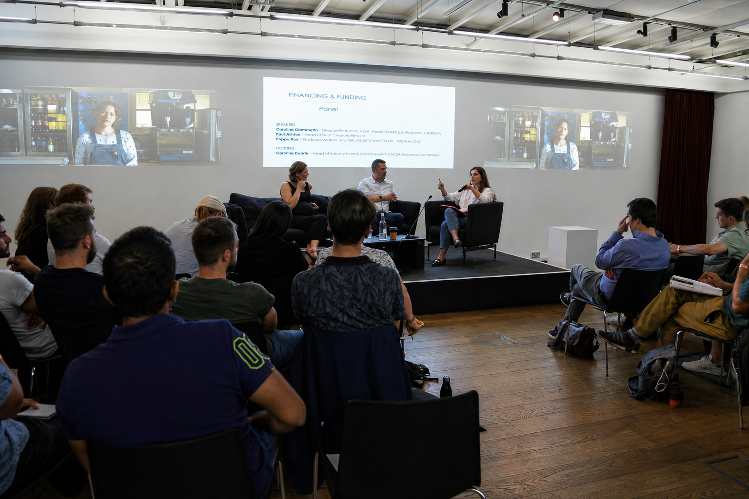 Carolina Duarte hosting a financing and funding panel for an industry audience